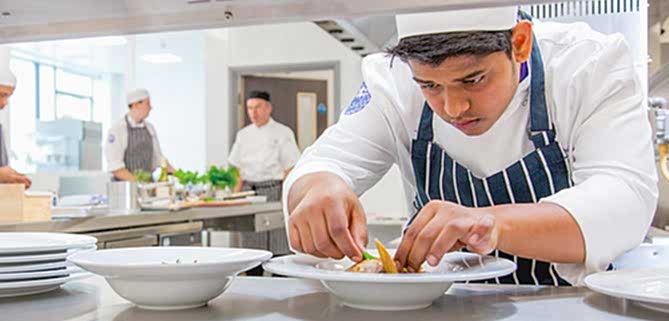 A young woman mixes music digitally