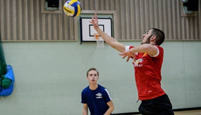 Men playing basketball