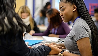 A student comforting another student